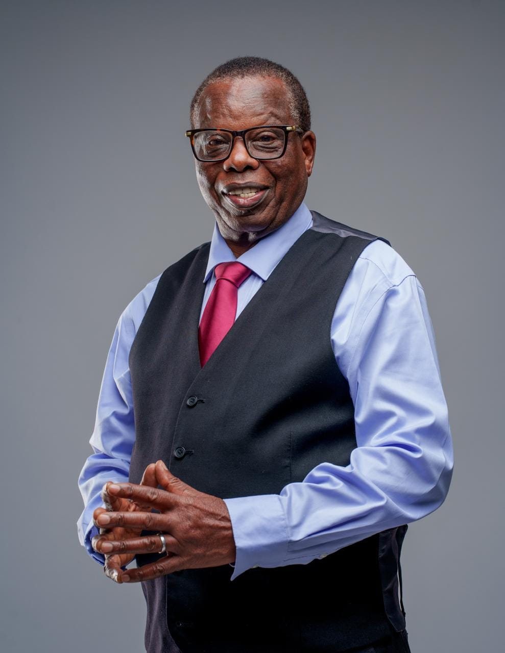 Dr. David Muhia Githii smiling